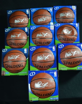 Lot of 10 Magic Johnson Autographed Basketballs
